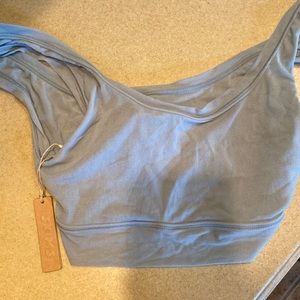 Skims large bralette, color is called sky. New with tags